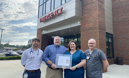 From left: Michael Daly NP-C, Director of Hospitalist Services, Zane P. Osborne, MD, MBA, FACEP Director - Emergency Department, Caroline Dittman, RN - Emergency Department, and, G. David Linder, RN - Emergency Department/ICU ManagerHampton Regional Medical Center has received the American Heart Association's GoldPlus Get With The Guidelines® - Stroke quality achievement award for its commitment to ensuring stroke patients receive the most appropriate treatment according to nationally recognized, research-based guidelines, ultimately leading to more lives saved and reduced disability.Picture from left: Michael Daly NP-C, Director of Hospitalist Services, Zane P. Osborne, MD, MBA, FACEP Director - Emergency Department, Caroline Dittman, RN - Emergency Department, and, G. David Linder, RN - Emergency Department/ICU Manager