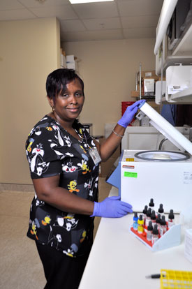 Nurse taking lab sample