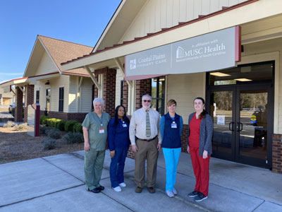 From left: Tonya Faircloth, Paulett Lee, Dr. Malcolm Horry, Leslie Atwood and Jessica Mosely.