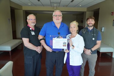 From left: David Linder, RN, Emergency Department Manager, Zane Osborne, MD, Emergency Department Director, Melanie Waggener, RN, Chief Nursing Officer, and Michael Daly, APRN, Director of Hospitalist Services.From left: David Linder, RN, Emergency Department Manager, Zane Osborne, MD, Emergency Department Director, Melanie Waggener, RN, Chief Nursing Officer, and Michael Daly, APRN, Director of Hospitalist Services.